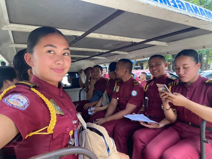 Trainees seated together inside a vehicle